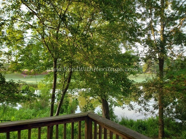 Building Photo - Gorgeous Brick Home with Golf Course / Lake View in Popular Mirror Lake Golf/ Swim / Tennis Subdi...