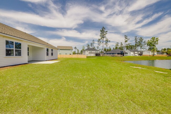 Building Photo - Beautiful 4BR Home in Woodland Trail – Top...