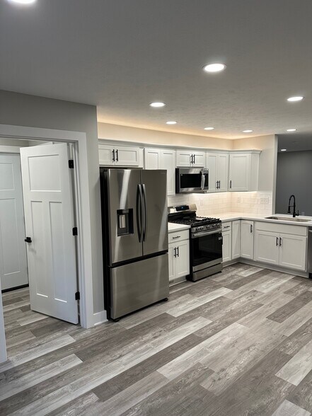 kitchen. Door leads to laundry room and garage. - 1622 Gunnison Rd