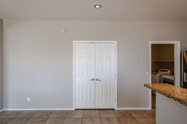 Building Photo - Welcome to this spacious 4 bedroom, 2.5 ba...