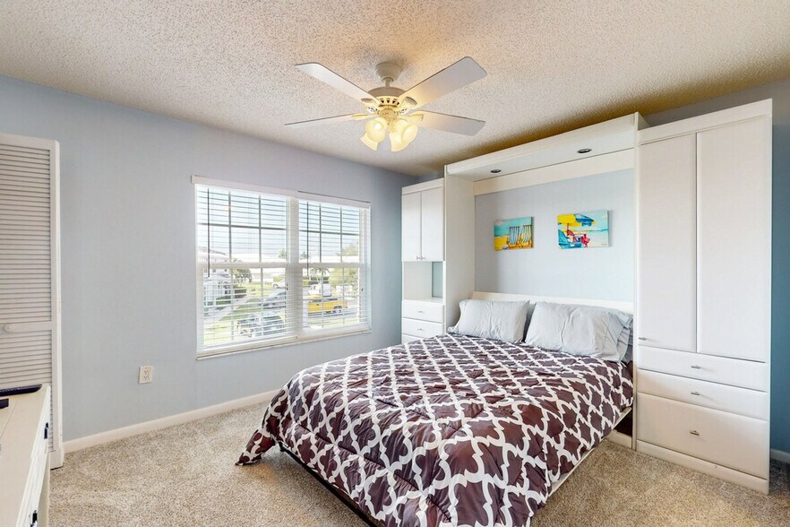 Building Photo - 65 Marco Villas E