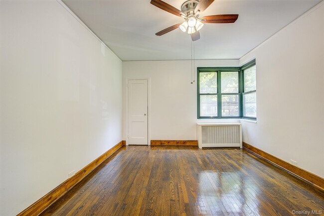 Building Photo - 34-40-40 79th St
