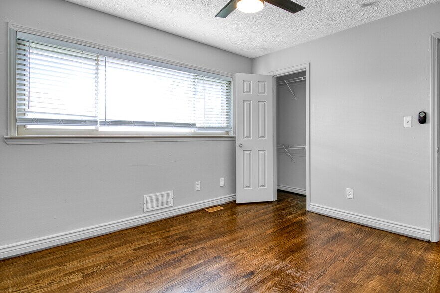 Bedroom (back) with storage & celing fan - 3447 Pierce St