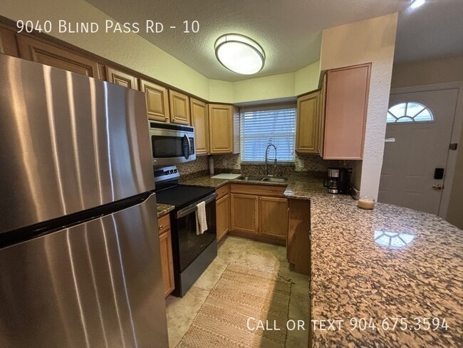 Building Photo - 9040 Blind Pass Rd
