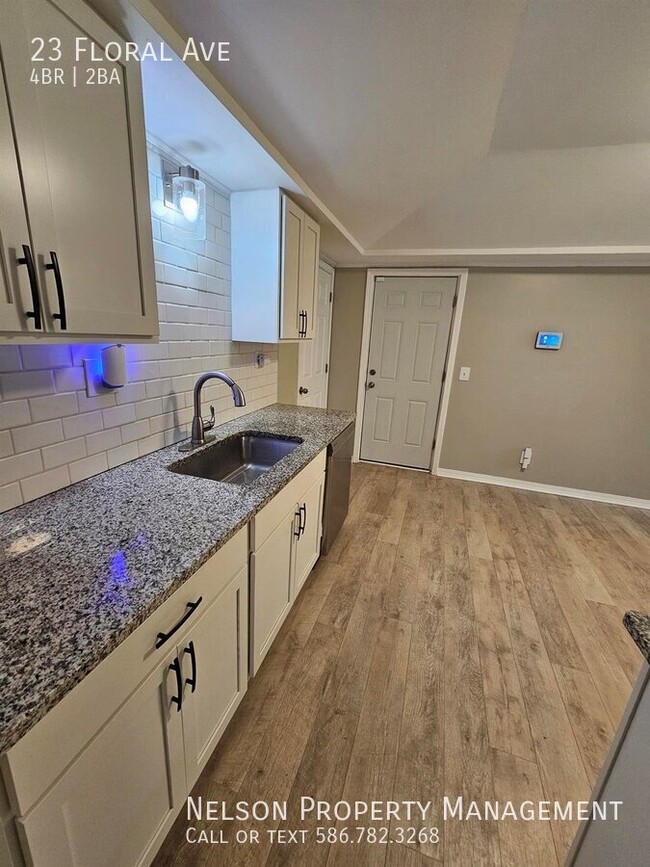 Building Photo - Beautifully Renovated 4 Bedroom Home w/ 2 ...