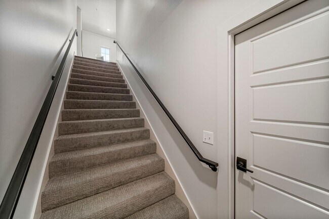 Building Photo - Discover modern elegance in the newly constructed Edgewater Condominiums, a boutique community fe...