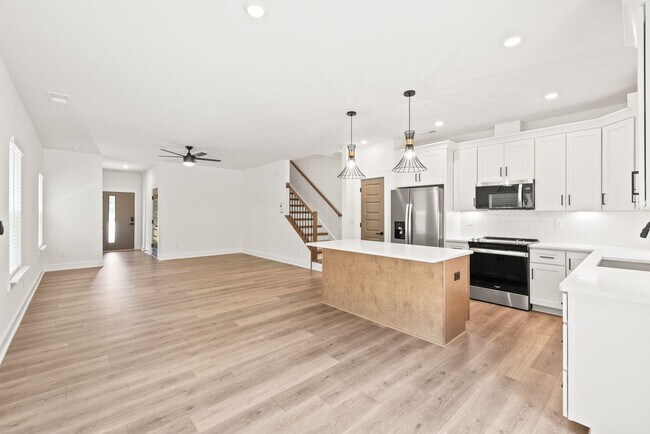 Building Photo - New Construction 3 Bedroom Townhome