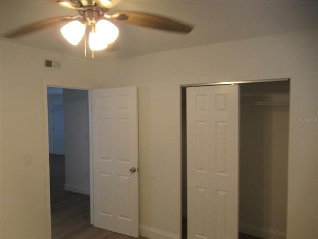 Building Photo - 7374 Royal Palm Dr
