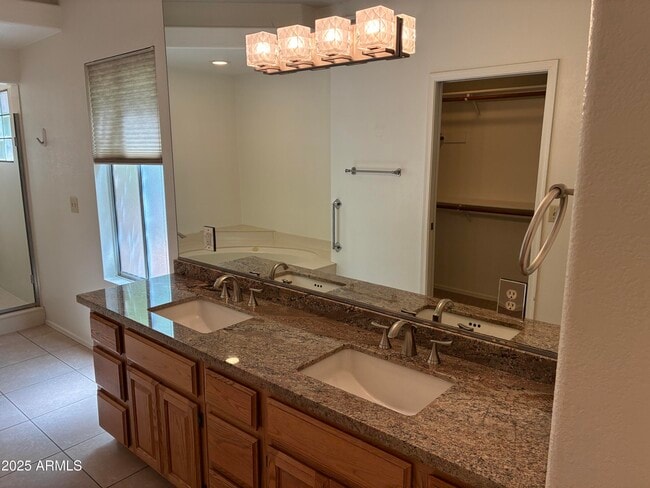 Building Photo - 7891 E Desert Cove Ave