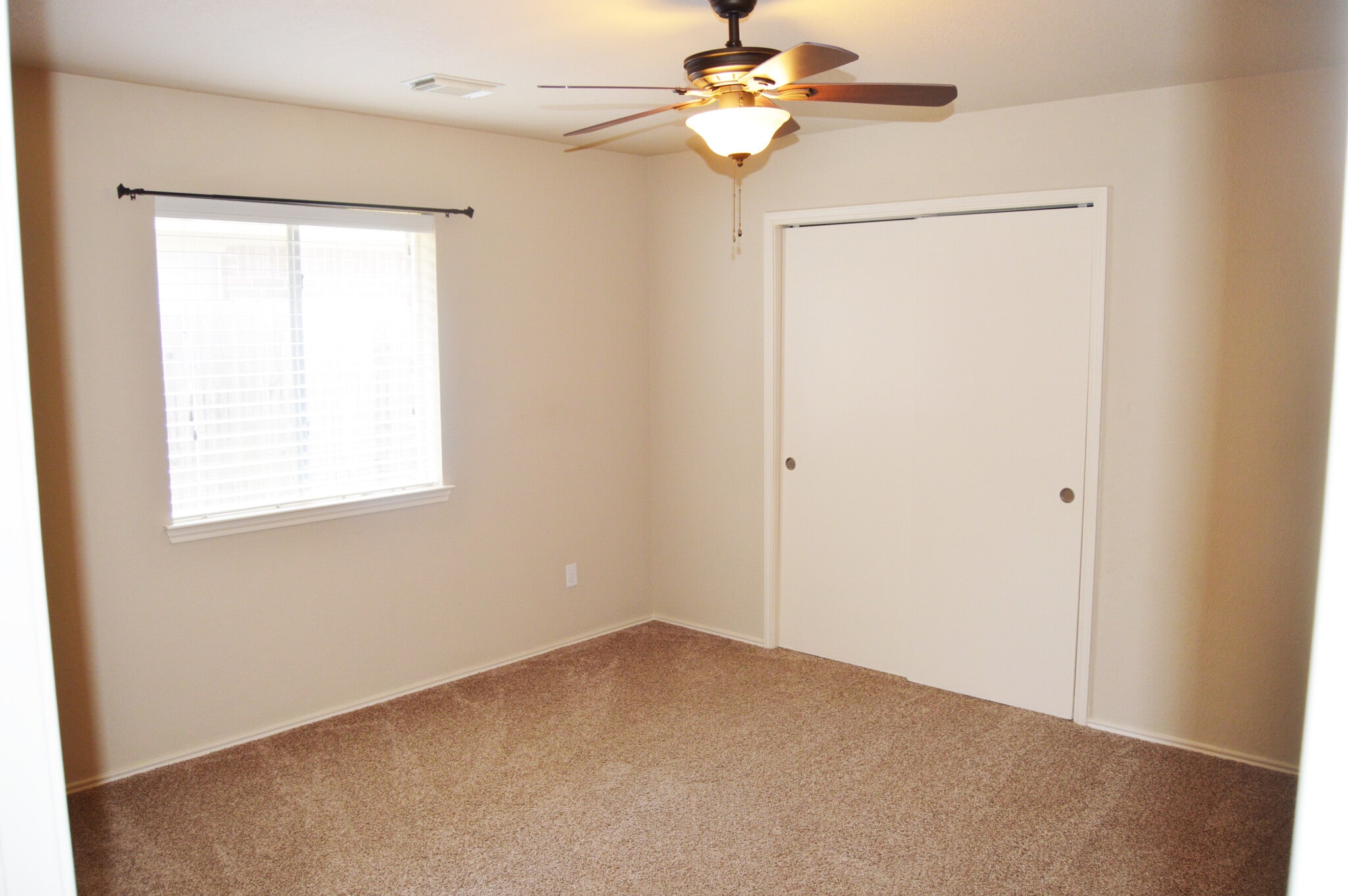 Bedroom 2 is located on the same side of the house as bedroom 1. - 23035 S Waterlily Dr