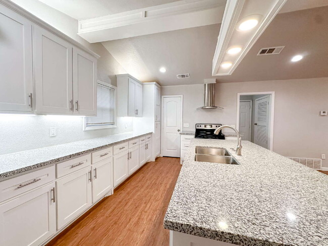 Building Photo - Spacious Living & Modern Upgrades