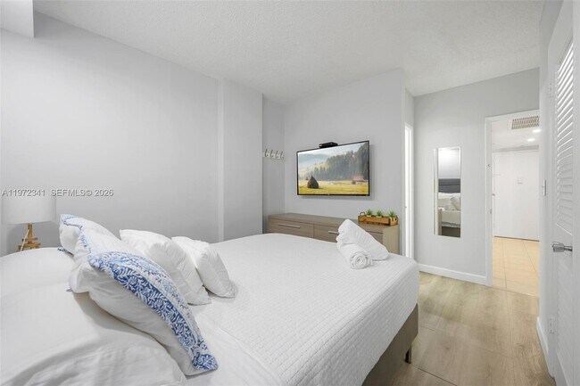 Building Photo - 19370 Collins Ave