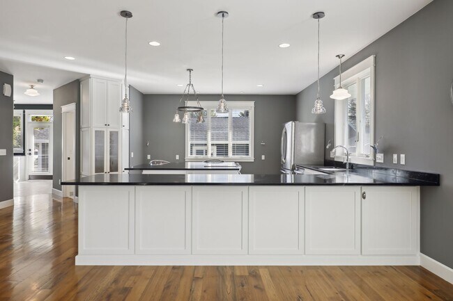 12' long Soapstone counter overhand with a large storage cabinet on the right. - 924 Eleanor Ave