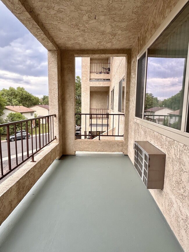 Experience tranquility with this charming balcony, perfect for relaxing and enjoying the view. - One Park View