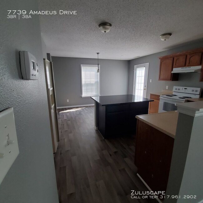 Building Photo - 7739 Amadeus Dr