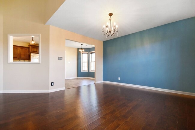 Building Photo - Pet Friendly Three Bedroom with Bonus!