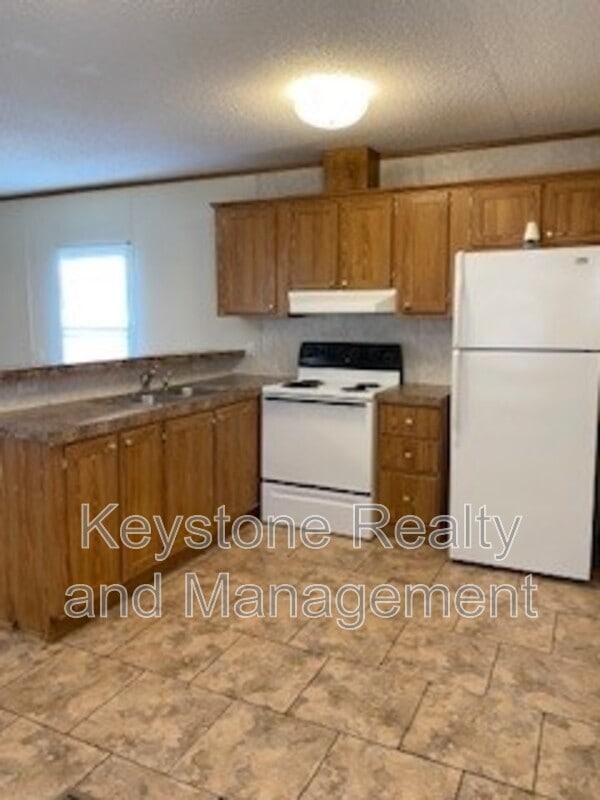 Building Photo - 703 Trevor Ln