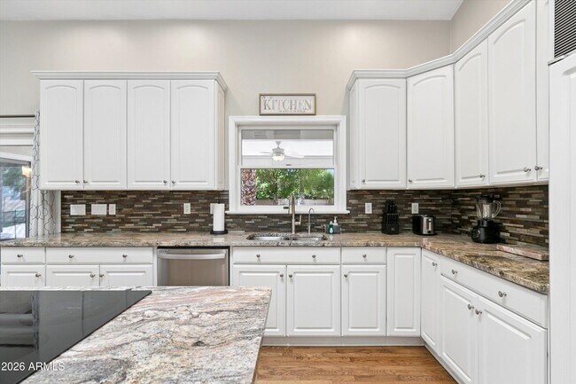 Building Photo - 8611 W Foothill Dr