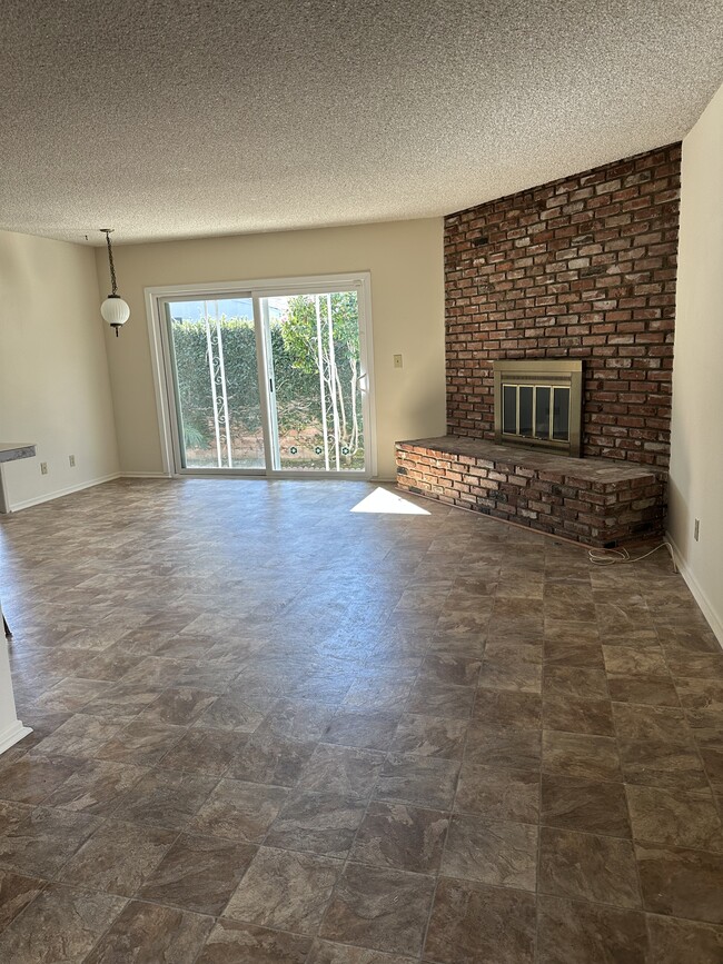 Family room with gas fireplace - 3337 Wade St