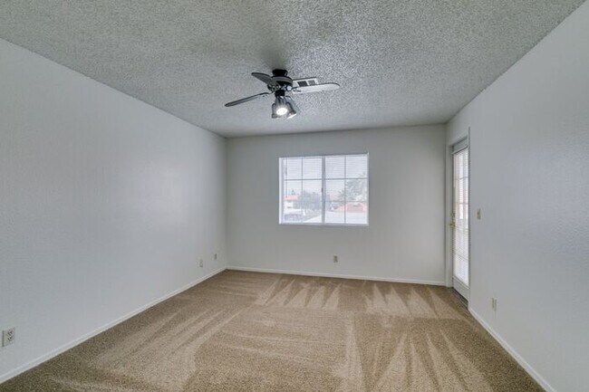 Building Photo - Charming Second-Floor Condo with Two Bedrooms and Fireplace