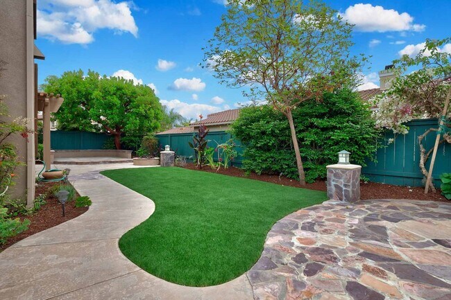 Building Photo - Gated corner lot home walking distance to the beach