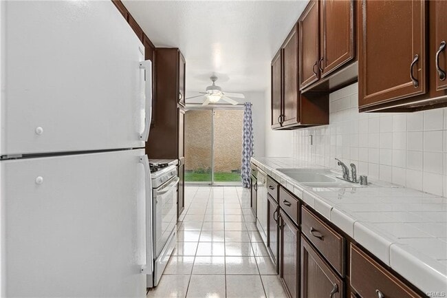 Building Photo - 10125 De Soto Ave