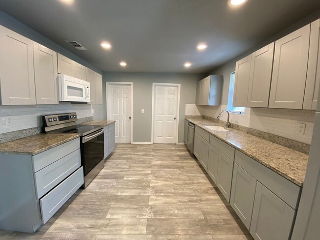 Building Photo - FALL INTO A NEW HOME WITH OUR MOVE-IN SPEC...