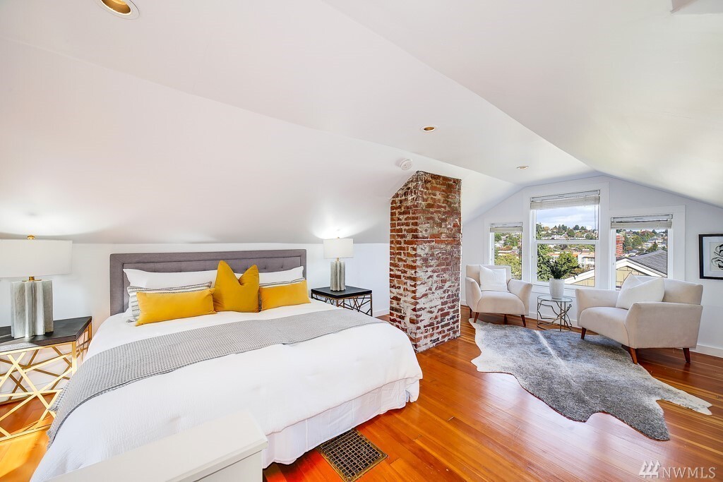 Master loft - the brick is now removed and there is a large skylight in its place! You can see the ferries coming in and fireworks from the Space Needle from your bed! - 4749 37th Ave SW