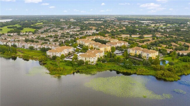 Building Photo - Beautiful WATERFRONT 3 bedrooms Condo located in MetroWest with ELEVATOR! Rare find!