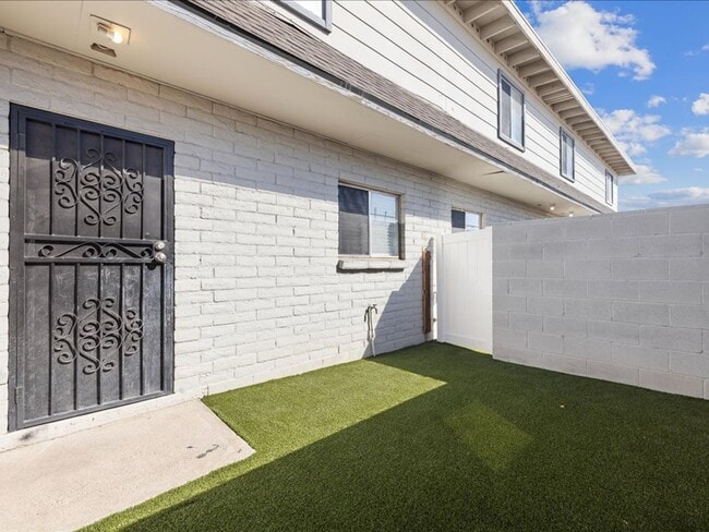 Building Photo - Two-Story Home with Brand New Appliances & Private Turf Backyard!