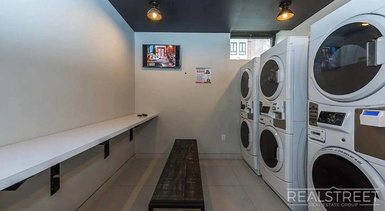 Building Photo - Bright 2 Bed / 1 Bath Loft-Style Residence with Multiple Balconies & Premium Amenities