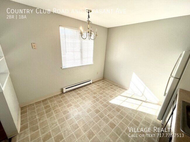 Building Photo - 605 Country Club Rd