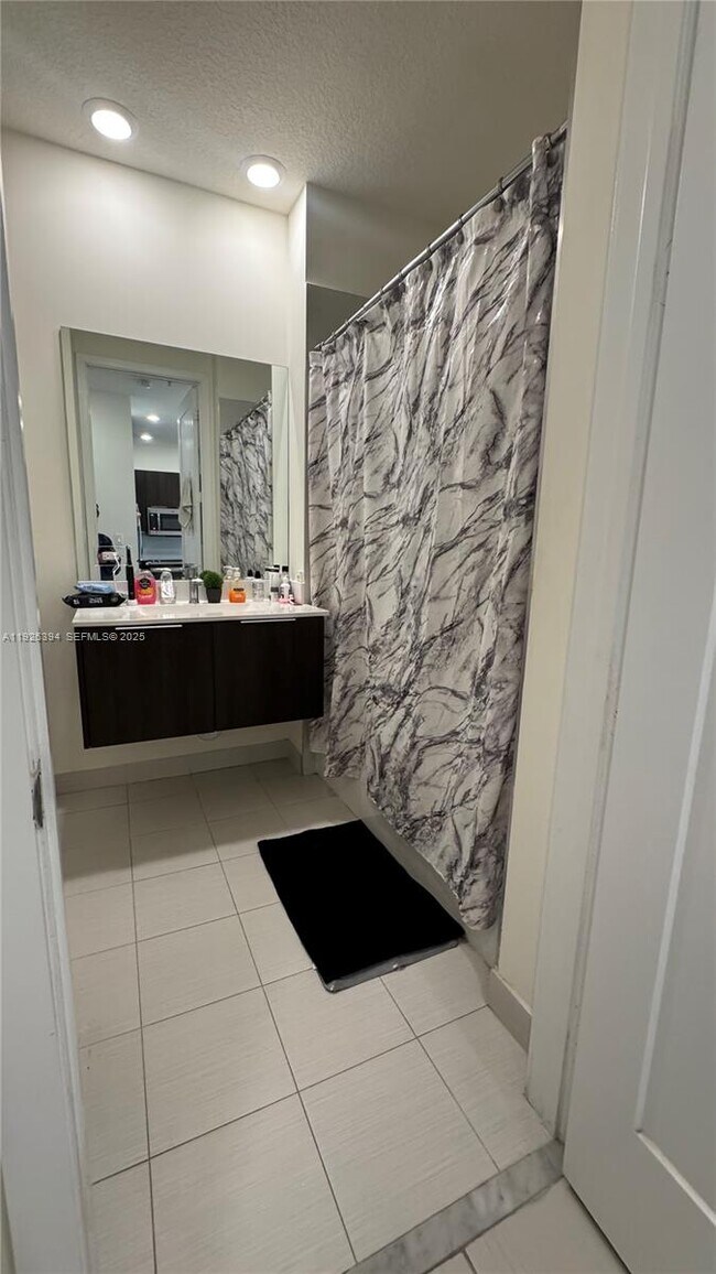 Building Photo - 6416 NW 102nd Ct