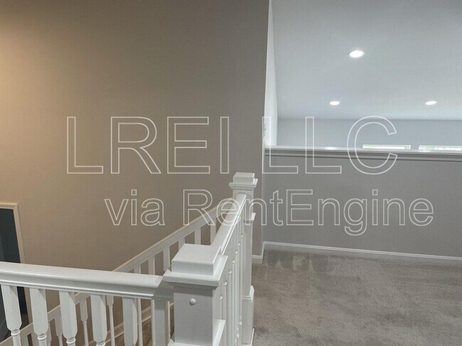 Building Photo - 9211 Tamarack Grove Ln