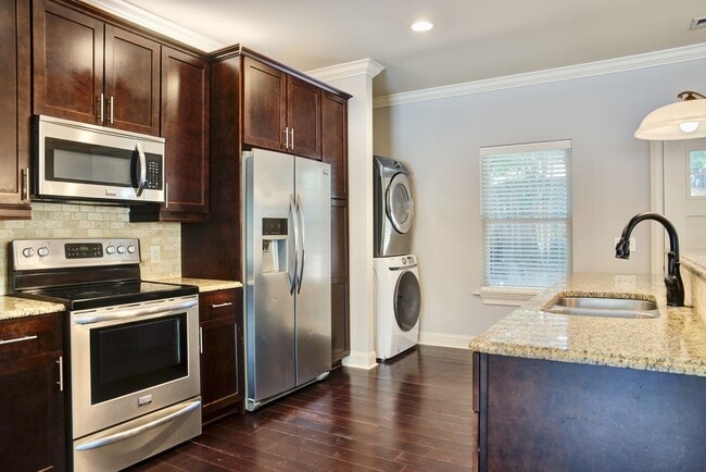 Building Photo - Heisman Villas: End Unit with Parking & Pr...