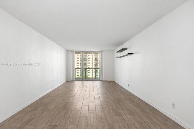 Building Photo - 19380 Collins Ave