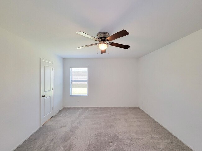 Building Photo - This single-story home has a comfortable layout with three bedrooms and a living area all on one ...