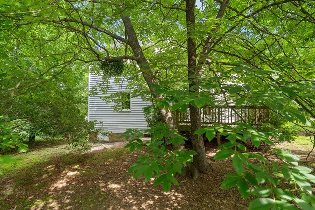 Building Photo - Durham Retreat with Vaulted Ceilings, Private Deck & Wooded Views