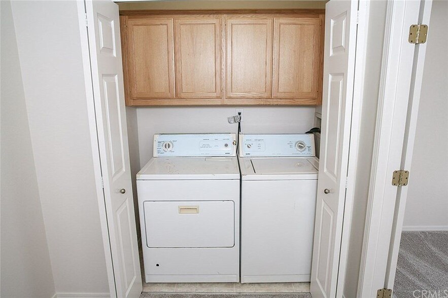 Washer dryer closet included at the top of the stairs on same level as bedrooms - 3051 Augusta St