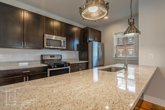 Building Photo - Available Now: One Month Free Rent!