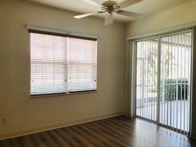 Building Photo - Experience Bell Tower Park. GATED ground floor 2 Bed 2 Bath Den 1 Car Garage Condo.