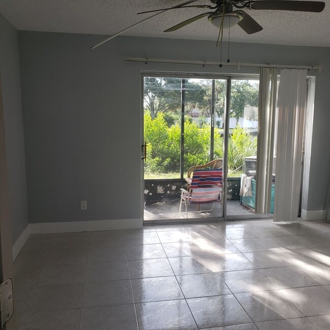 Building Photo - Beautiful water view ground floor condo in...