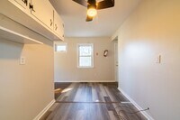 Building Photo - 4-Bedroom Home with Garage, Gated Yard & Sunroom