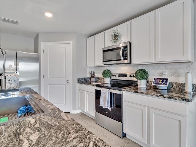 Building Photo - 5289 Fiddle Fig Ave