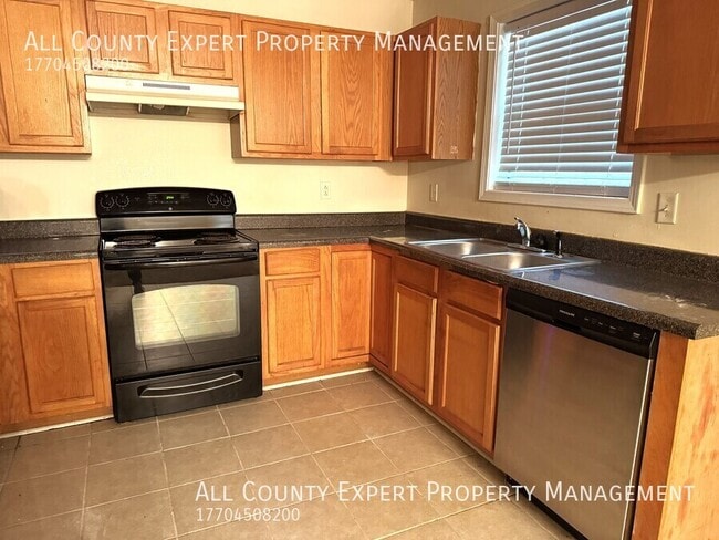 Building Photo - 7066 Ravenwood Ln