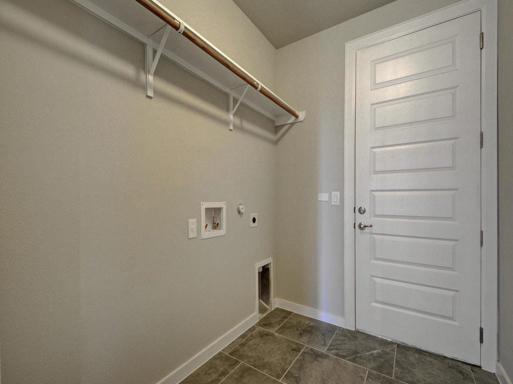 Washer and Dryer room. It will be included if needed. - 6808 Cardinal Bloom Loop