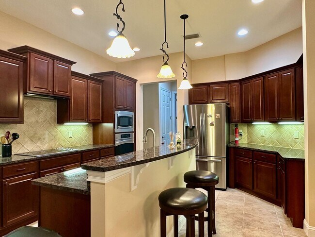 Building Photo - Gated Community! Walking Distance to the B...