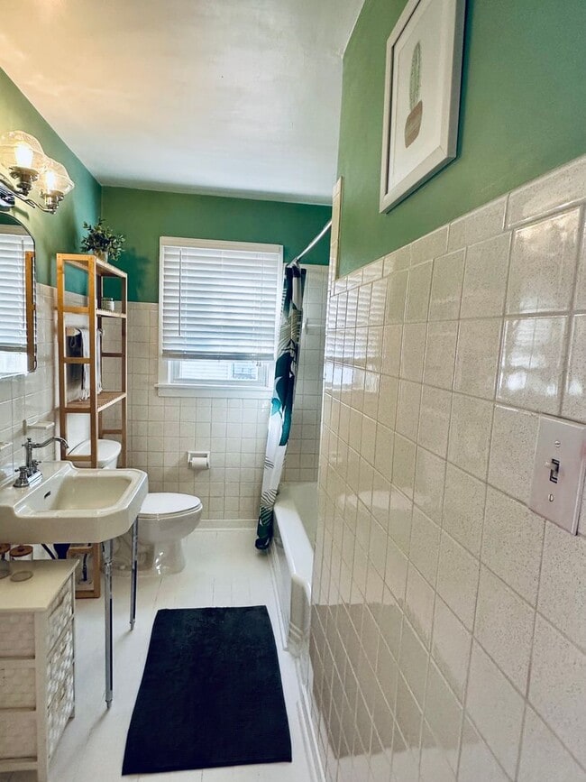 Building Photo - {8520} Charming Four Bedroom in Fantastic Location + Two Main Floor Bedrooms + Hardwood Floors + ...