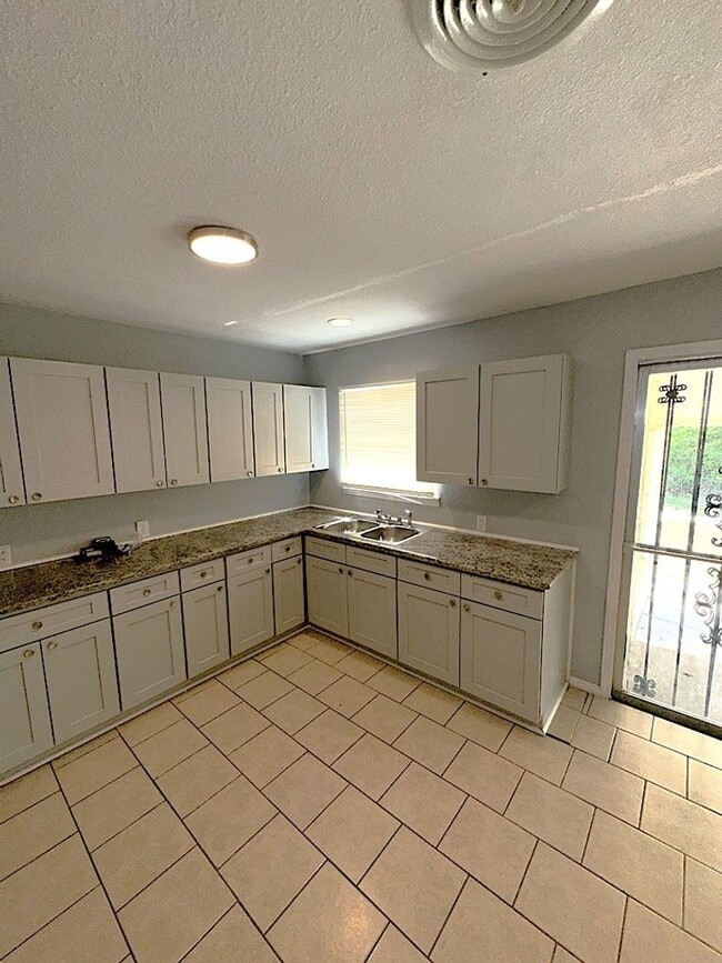 Building Photo - NEW IN MANAGEMENT - AVAILABLE NOW!