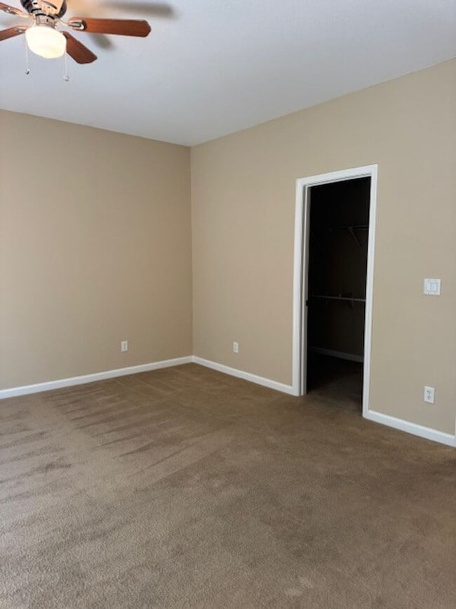 Building Photo - Located in a Quiet, Gated Community in Car...